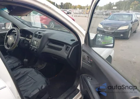 2009 Kia Sportage Lx z USA, uszkodzony, nr VIN KNDJF724X97565212